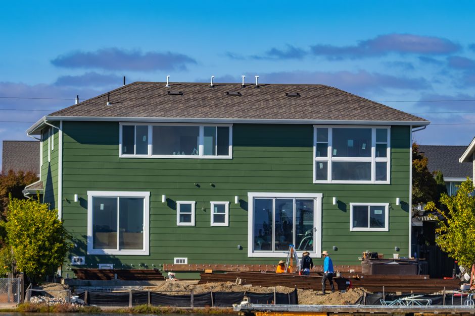 Double hung windows being installed by a professional